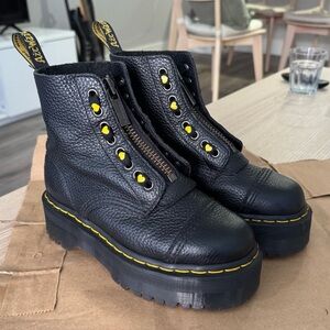 Dr. Martens Sinclair Milled Nappa Leather Platform Boots with yellow heart laces
